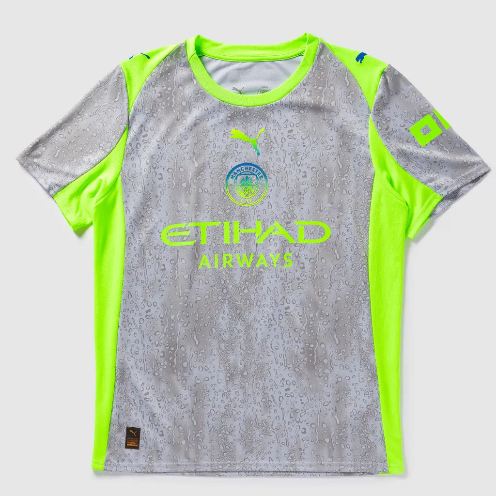 Camisa terceira do Manchester City Puma 2025 2026 cinza chumbo com detalhes verdes e escudo centralizado no peito